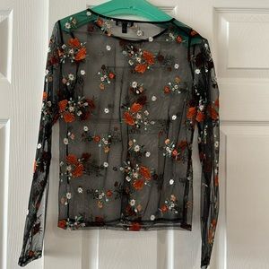 Long sleeve sheer lace top with red roses.